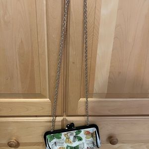 White Brighton clutch bag with butterfly’s